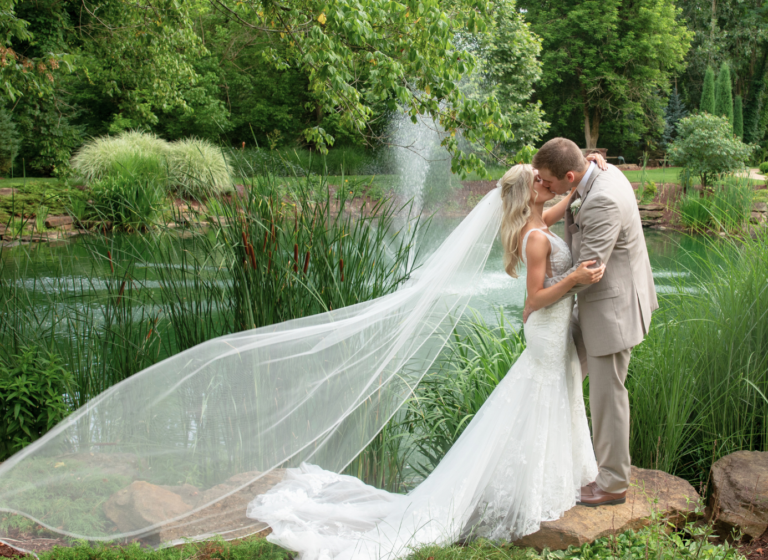 Couple kissing in garden